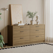 Platsa grey oak six drawer chest with black handles beside a floor lamp