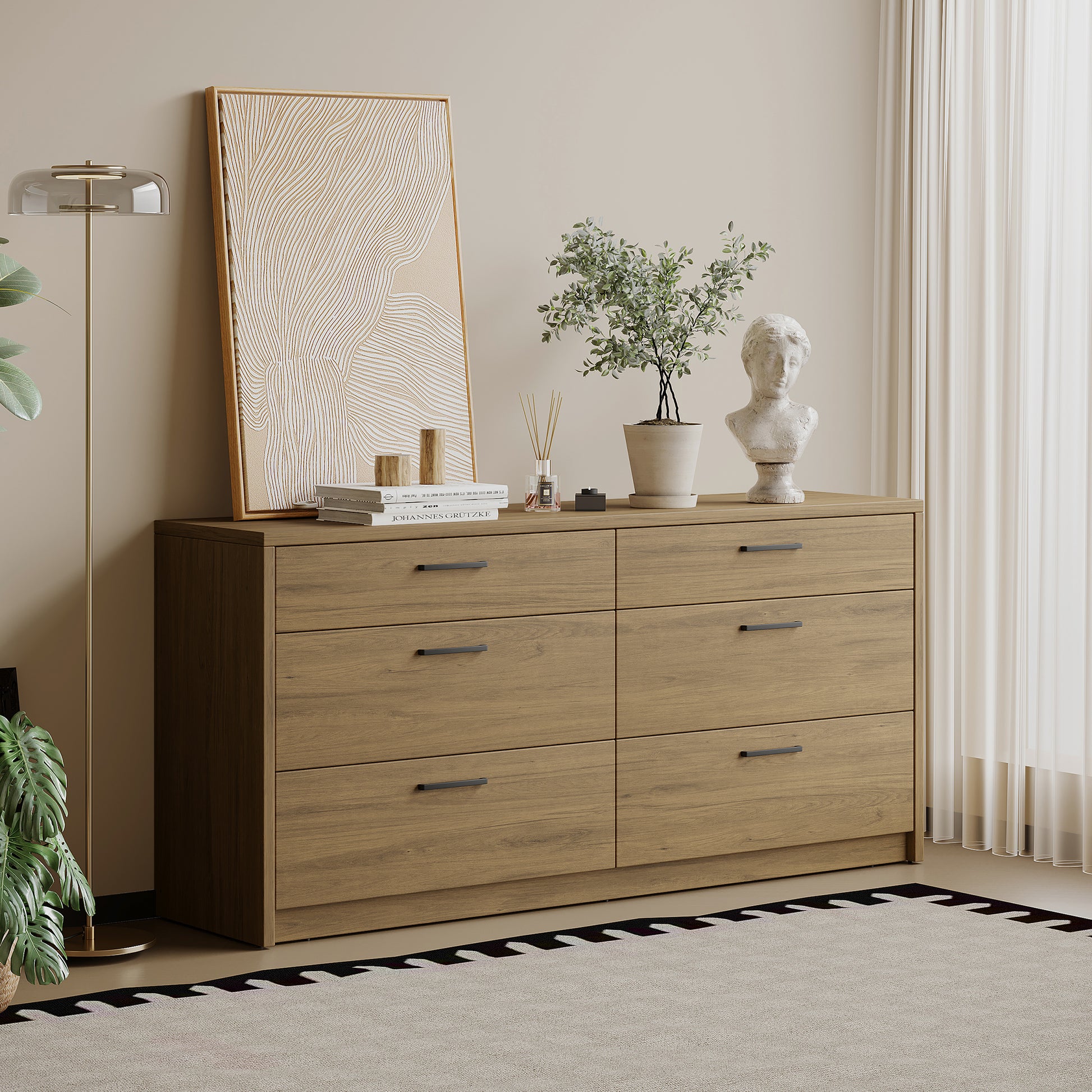 Platsa grey oak six drawer chest with black handles beside a floor lamp