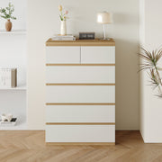 Sotta six drawer tallboy in oak and white in a bedroom