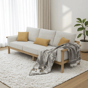 Remini cream three seater sofa with timber frame and lumbar cushions