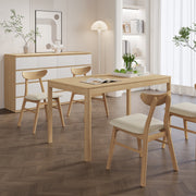 Modica minimal light wood dining table with cream upholstered chairs