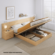 Ovada oak gas lift storage bed base with mattress raised showing storage